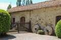 Old building and wooden gate ancient Grazzano Visconti