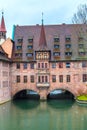 Old buildings and arch bridge reflected in water. Nuremberg, Bavaria Royalty Free Stock Photo