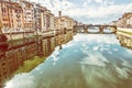 Old buildings and beautiful Ponte Santa Trinita, Arno, Florence, Italy, yellow filter Royalty Free Stock Photo