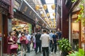 Old buildings in Chinese architecture style converted to modern shopping places on Yuyuan Old Street in downtown Shanghai, China Royalty Free Stock Photo