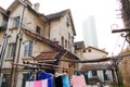 Old buildings coexist with modern skyscrapers in Shanghai, China Royalty Free Stock Photo