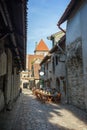 Old buildings and tourists at the Old Town in Tallinn Royalty Free Stock Photo