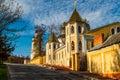 Old buildings in the Gothic style in the rays of the setting sun against the blue spring sky. Bryansk, Russia-April 2018