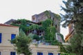 Old buildings in Greece with lot of greenery.