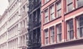 Old buildings with iron fire escapes, color toning applied, New York City, USA Royalty Free Stock Photo