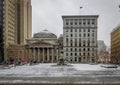 Old Buildings in Place d`Armes with snow - Montreal, Quebec, Canada Royalty Free Stock Photo