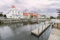 Old buildings at the side of Kali Besar River with cloudy sky at the background, Old City Tourism Area / Kawasan Wisata Kota Tua.