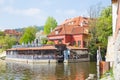 Old buildings and street view. Vltava river with glare. Travel photo 2019