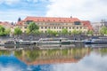 Old buildings and street view. Vltava river with glare. Travel photo 2019