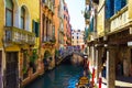 Picturesque view of narrow canal vintage architecture Venice Italy Royalty Free Stock Photo