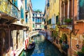 Picturesque view of narrow canal vintage architecture Venice Italy Royalty Free Stock Photo