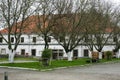 Old buildnig with garden and green alley at the Dubno