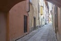 Old builings on cobbled narrow lane in historical town, Rovato, Italy Royalty Free Stock Photo