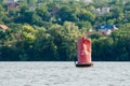 Old buoy on the river, red buoy, Royalty Free Stock Photo