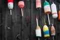 Old Buoys Hung on Side of Fishing Shack Royalty Free Stock Photo