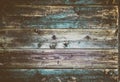 Old burned boards with nails in brown and black colour Royalty Free Stock Photo