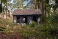 Old burned-out house. Burned abandoned house in an urban neighborhood. Single family home completely destroyed by fire Royalty Free Stock Photo