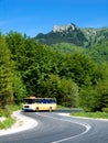 Old bus in mountain highway Royalty Free Stock Photo