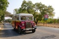 An old bus running on rural street in Bagan