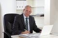 Old Business man with Laptop Royalty Free Stock Photo