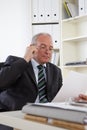 Old Business man in office Royalty Free Stock Photo