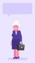 Old business woman three quarters face holding suitcase and smiling