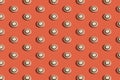 Old button pattern on a red background.