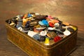 The old buttons. Buttons in an old metal box. Royalty Free Stock Photo