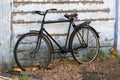 Old bycicle near wall Royalty Free Stock Photo