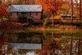 Old Cabin by the Lake in the Alabama Wildernes Royalty Free Stock Photo