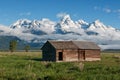 Old Cabin Under Mountains Royalty Free Stock Photo