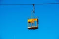 Old cable car in Dnepropetrovsk. Cable car cabins against the background of the blue sky and the urban landscape Royalty Free Stock Photo