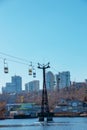 Old cable car in Dnepropetrovsk. Cable car cabins against the background of the blue sky and the urban landscape Royalty Free Stock Photo