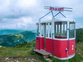 Old cable car or lift gondola in peak panorama of Monte Baldo mountain near Malcesine in Italy Royalty Free Stock Photo