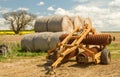 Old cambridge arable roller with bales of hay Royalty Free Stock Photo