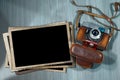 Old Camera and Blank Photo Frames Royalty Free Stock Photo