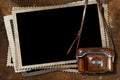 Old Camera and Blank Photo Frames Royalty Free Stock Photo