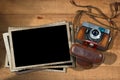 Old Camera and Blank Photo Frames Royalty Free Stock Photo