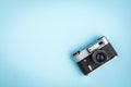 Old camera on blue background Royalty Free Stock Photo