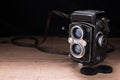 Old Camera Photo on a wooden surface Royalty Free Stock Photo