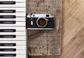 Old camera, piano Royalty Free Stock Photo