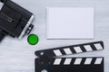 Old camera for shooting and clapperboard for cinema on a light background Royalty Free Stock Photo