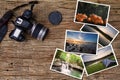 Old camera and stack of photos on vintage grunge wooden background