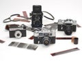 Old cameras and photographic films. Royalty Free Stock Photo