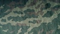 Old camouflage cloth pattern. Royalty Free Stock Photo