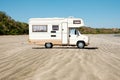 Old camping bus, rv camper van at beach Royalty Free Stock Photo