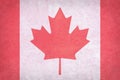 Old Canada flag pattern on stone Royalty Free Stock Photo