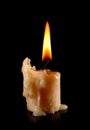 old candle on black background Royalty Free Stock Photo