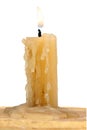 Old candle isolated on a white background Royalty Free Stock Photo