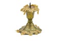 An old candlestick with a melted extinct candle Royalty Free Stock Photo